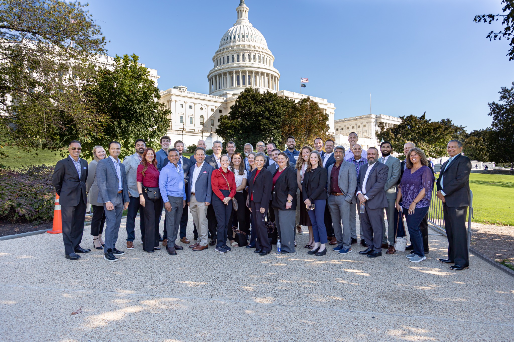 Health AI Summit attendees gathered in front of the U.S. Capitol